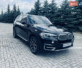 Чорний БМВ Х5, об'ємом двигуна 2.99 л та пробігом 298 тис. км за 29400 $, фото 1 на Automoto.ua