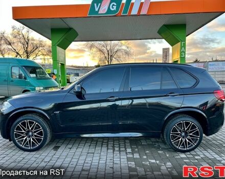 Чорний БМВ Х5, об'ємом двигуна 3 л та пробігом 142 тис. км за 29999 $, фото 1 на Automoto.ua