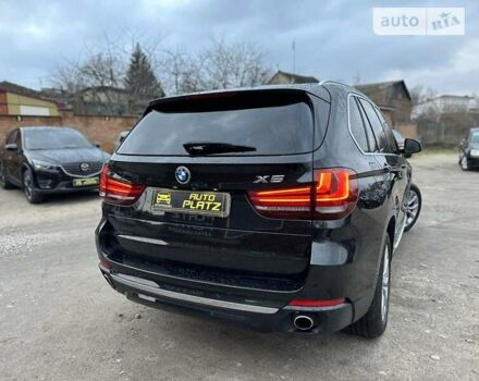 Чорний БМВ Х5, об'ємом двигуна 3 л та пробігом 235 тис. км за 32300 $, фото 4 на Automoto.ua