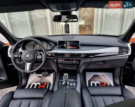 Черный БМВ Х5, объемом двигателя 3 л и пробегом 258 тыс. км за 34700 $, фото 74 на Automoto.ua