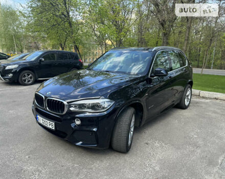 Чорний БМВ Х5, об'ємом двигуна 3 л та пробігом 141 тис. км за 28000 $, фото 1 на Automoto.ua