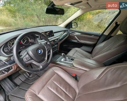 Черный БМВ Х5, объемом двигателя 3 л и пробегом 314 тыс. км за 16700 $, фото 16 на Automoto.ua