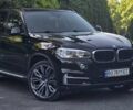 Чорний БМВ Х5, об'ємом двигуна 2 л та пробігом 198 тис. км за 23000 $, фото 1 на Automoto.ua