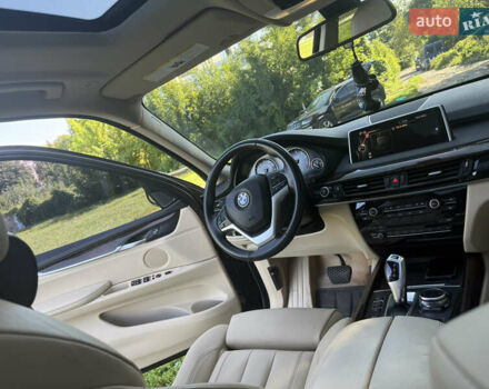 Черный БМВ Х5, объемом двигателя 3 л и пробегом 107 тыс. км за 25500 $, фото 4 на Automoto.ua