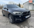 Чорний БМВ Х5, об'ємом двигуна 3 л та пробігом 203 тис. км за 28700 $, фото 1 на Automoto.ua