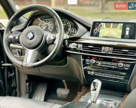 Черный БМВ Х5, объемом двигателя 3 л и пробегом 235 тыс. км за 17995 $, фото 32 на Automoto.ua