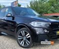 Черный БМВ Х5, объемом двигателя 3 л и пробегом 167 тыс. км за 24700 $, фото 1 на Automoto.ua