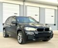 Чорний БМВ Х5, об'ємом двигуна 3 л та пробігом 100 тис. км за 15900 $, фото 1 на Automoto.ua