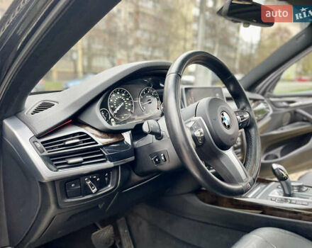 Черный БМВ Х5, объемом двигателя 3 л и пробегом 235 тыс. км за 17995 $, фото 44 на Automoto.ua