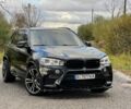 Черный БМВ Х5, объемом двигателя 4.4 л и пробегом 130 тыс. км за 33200 $, фото 1 на Automoto.ua