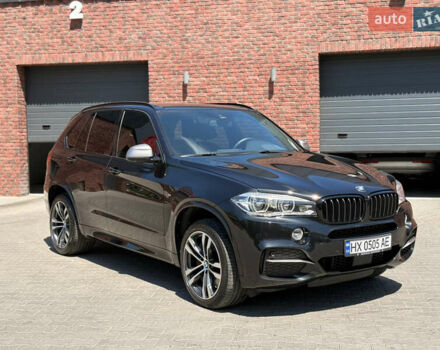 Черный БМВ Х5, объемом двигателя 3 л и пробегом 130 тыс. км за 39500 $, фото 1 на Automoto.ua