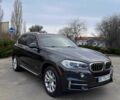 Чорний БМВ Х5, об'ємом двигуна 3 л та пробігом 182 тис. км за 23500 $, фото 1 на Automoto.ua