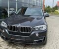 Черный БМВ Х5, объемом двигателя 2.98 л и пробегом 194 тыс. км за 18000 $, фото 1 на Automoto.ua