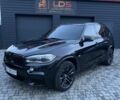 Чорний БМВ Х5, об'ємом двигуна 4.4 л та пробігом 155 тис. км за 26000 $, фото 1 на Automoto.ua