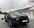 Черный БМВ Х5, объемом двигателя 3 л и пробегом 83 тыс. км за 23800 $, фото 1 на Automoto.ua