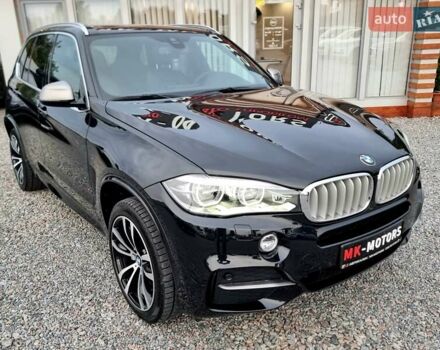 Черный БМВ Х5, объемом двигателя 3 л и пробегом 258 тыс. км за 34700 $, фото 1 на Automoto.ua