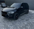 Черный БМВ Х5, объемом двигателя 3 л и пробегом 200 тыс. км за 26500 $, фото 1 на Automoto.ua