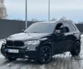 Чорний БМВ Х5, об'ємом двигуна 3 л та пробігом 130 тис. км за 24800 $, фото 1 на Automoto.ua