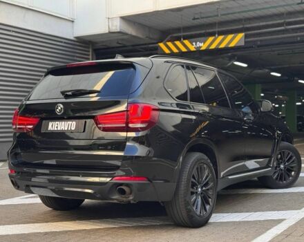 Черный БМВ Х5, объемом двигателя 3 л и пробегом 125 тыс. км за 22900 $, фото 2 на Automoto.ua