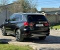 Черный БМВ Х5, объемом двигателя 3 л и пробегом 100 тыс. км за 23900 $, фото 4 на Automoto.ua