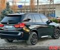 Чорний БМВ Х5, об'ємом двигуна 3 л та пробігом 142 тис. км за 29999 $, фото 2 на Automoto.ua