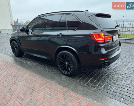 Черный БМВ Х5, объемом двигателя 3 л и пробегом 141 тыс. км за 41000 $, фото 4 на Automoto.ua