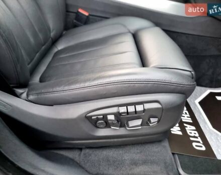 Черный БМВ Х5, объемом двигателя 3 л и пробегом 258 тыс. км за 34700 $, фото 78 на Automoto.ua