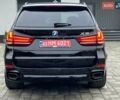 Черный БМВ Х5, объемом двигателя 3 л и пробегом 240 тыс. км за 26900 $, фото 9 на Automoto.ua