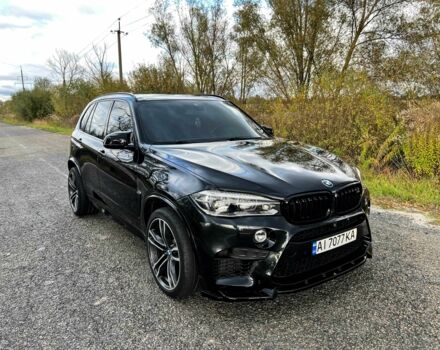 Черный БМВ Х5, объемом двигателя 4.4 л и пробегом 130 тыс. км за 33200 $, фото 1 на Automoto.ua