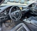 Черный БМВ Х5, объемом двигателя 3 л и пробегом 230 тыс. км за 32500 $, фото 2 на Automoto.ua
