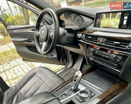 Черный БМВ Х5, объемом двигателя 3 л и пробегом 235 тыс. км за 17995 $, фото 28 на Automoto.ua