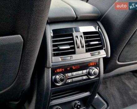 Черный БМВ Х5, объемом двигателя 3 л и пробегом 258 тыс. км за 34700 $, фото 71 на Automoto.ua