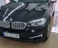 Чорний БМВ Х5, об'ємом двигуна 2 л та пробігом 128 тис. км за 23500 $, фото 1 на Automoto.ua