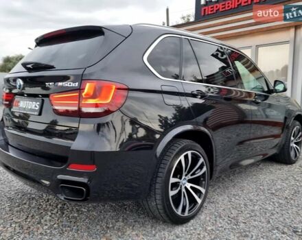 Черный БМВ Х5, объемом двигателя 3 л и пробегом 258 тыс. км за 34700 $, фото 2 на Automoto.ua