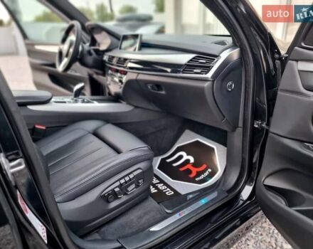 Черный БМВ Х5, объемом двигателя 3 л и пробегом 258 тыс. км за 34700 $, фото 77 на Automoto.ua