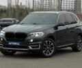 Черный БМВ Х5, объемом двигателя 3 л и пробегом 148 тыс. км за 25000 $, фото 1 на Automoto.ua