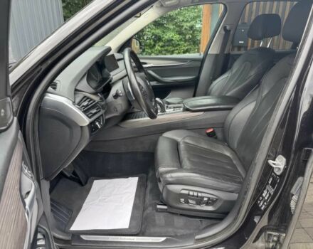 Чорний БМВ Х5, об'ємом двигуна 3 л та пробігом 73 тис. км за 11000 $, фото 4 на Automoto.ua