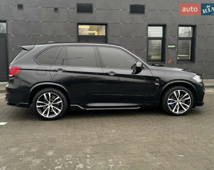 Чорний БМВ Х5, об'ємом двигуна 3 л та пробігом 177 тис. км за 33900 $, фото 4 на Automoto.ua
