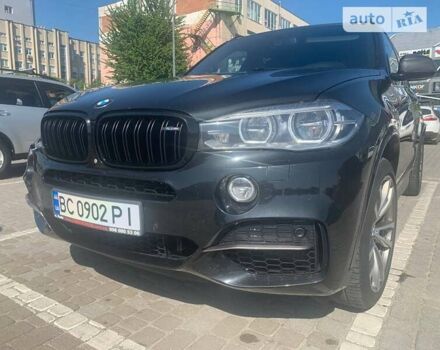 Чорний БМВ Х5, об'ємом двигуна 3 л та пробігом 233 тис. км за 31500 $, фото 2 на Automoto.ua