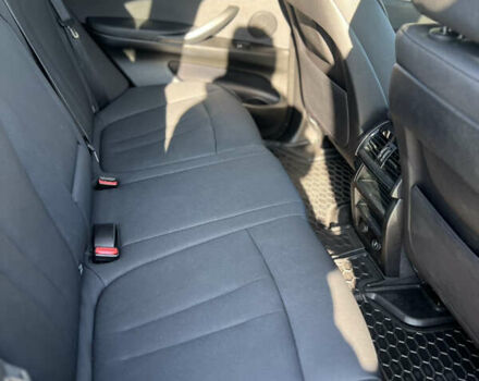 Черный БМВ Х5, объемом двигателя 3 л и пробегом 155 тыс. км за 21500 $, фото 6 на Automoto.ua