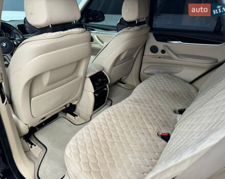 Черный БМВ Х5, объемом двигателя 3 л и пробегом 146 тыс. км за 25950 $, фото 16 на Automoto.ua