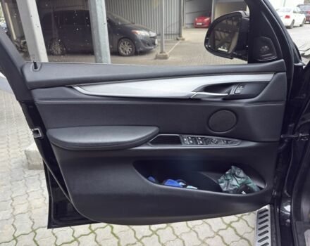 Черный БМВ Х5, объемом двигателя 3 л и пробегом 178 тыс. км за 20200 $, фото 14 на Automoto.ua