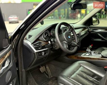 Черный БМВ Х5, объемом двигателя 3 л и пробегом 152 тыс. км за 24500 $, фото 5 на Automoto.ua