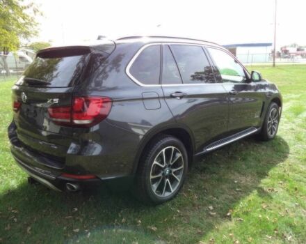 Черный БМВ Х5, объемом двигателя 3 л и пробегом 78 тыс. км за 19800 $, фото 7 на Automoto.ua