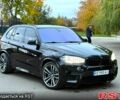 Черный БМВ Х5, объемом двигателя 4.4 л и пробегом 170 тыс. км за 37999 $, фото 1 на Automoto.ua