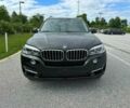 Черный БМВ Х5, объемом двигателя 3 л и пробегом 76 тыс. км за 11900 $, фото 1 на Automoto.ua