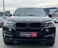 Чорний БМВ Х5, об'ємом двигуна 2 л та пробігом 135 тис. км за 27490 $, фото 1 на Automoto.ua