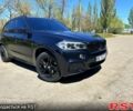 Чорний БМВ Х5, об'ємом двигуна 2 л та пробігом 136 тис. км за 28600 $, фото 1 на Automoto.ua