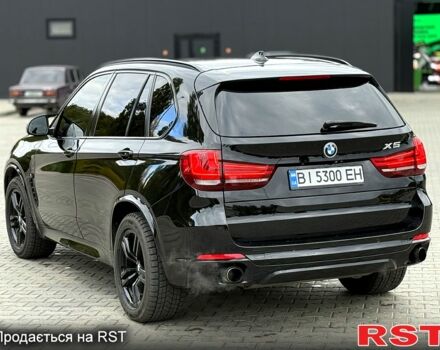 Черный БМВ Х5, объемом двигателя 3 л и пробегом 152 тыс. км за 24500 $, фото 4 на Automoto.ua