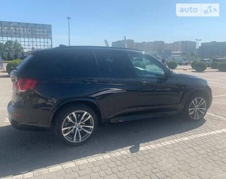 Чорний БМВ Х5, об'ємом двигуна 3 л та пробігом 233 тис. км за 31500 $, фото 4 на Automoto.ua